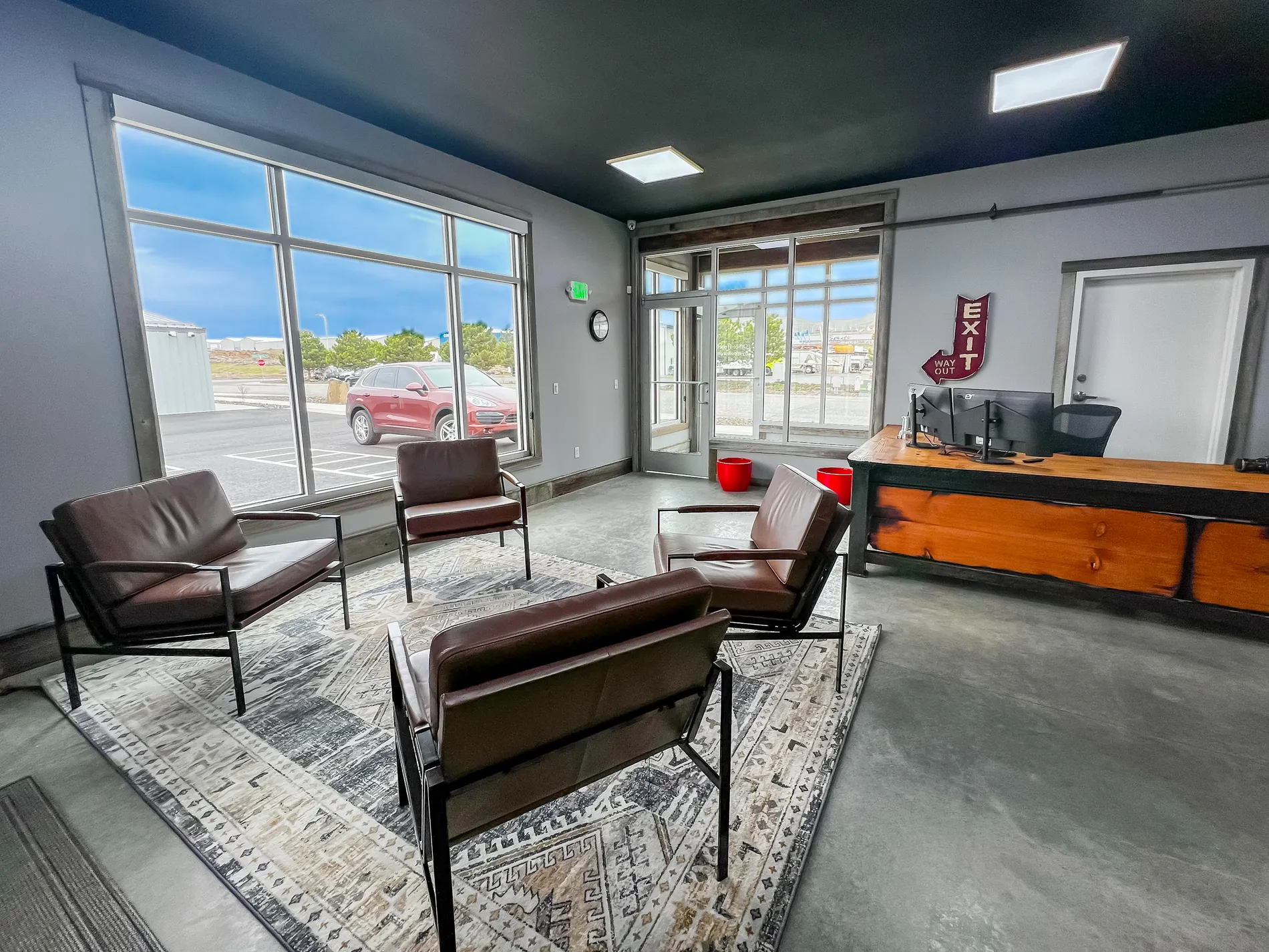 Modern customer lounge with comfortable seating inside Wheatland Self Storage office